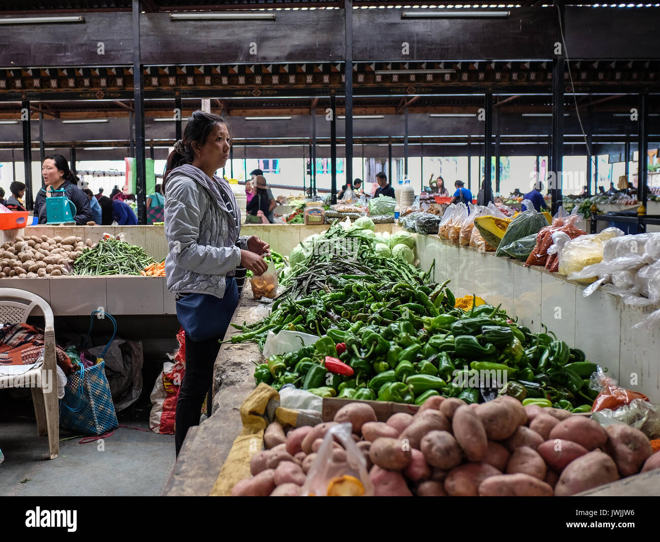 Thimphu, Bhutan - Aug 29, 2015. A woman at rural market in Thimphu, Bhutan. In South Asia, Bhutan ranks first in economic freedom, ease of doing busin Stock Photo