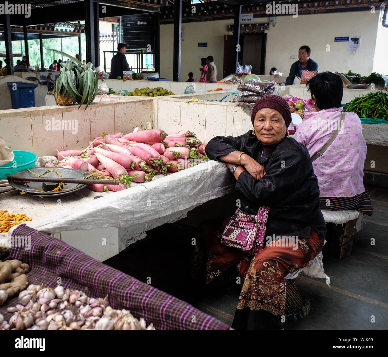 Thimphu, Bhutan - Aug 29, 2015. People at rural market in Thimphu, Bhutan. In South Asia, Bhutan ranks first in economic freedom, ease of doing busine Stock Photo