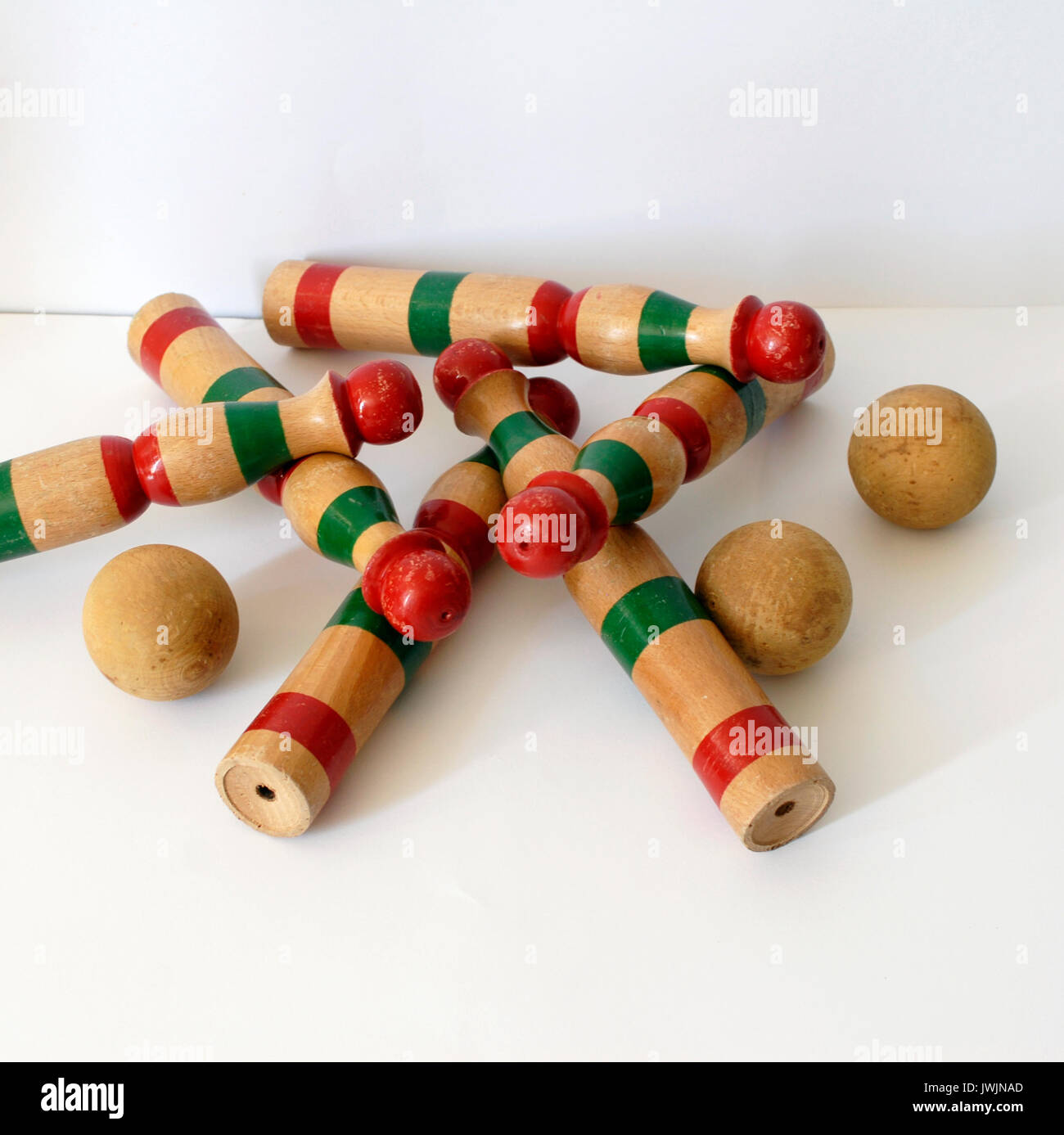 Vintage wooden bowling kit game, with balls. Made in Spain, with colors green and red Stock Photo