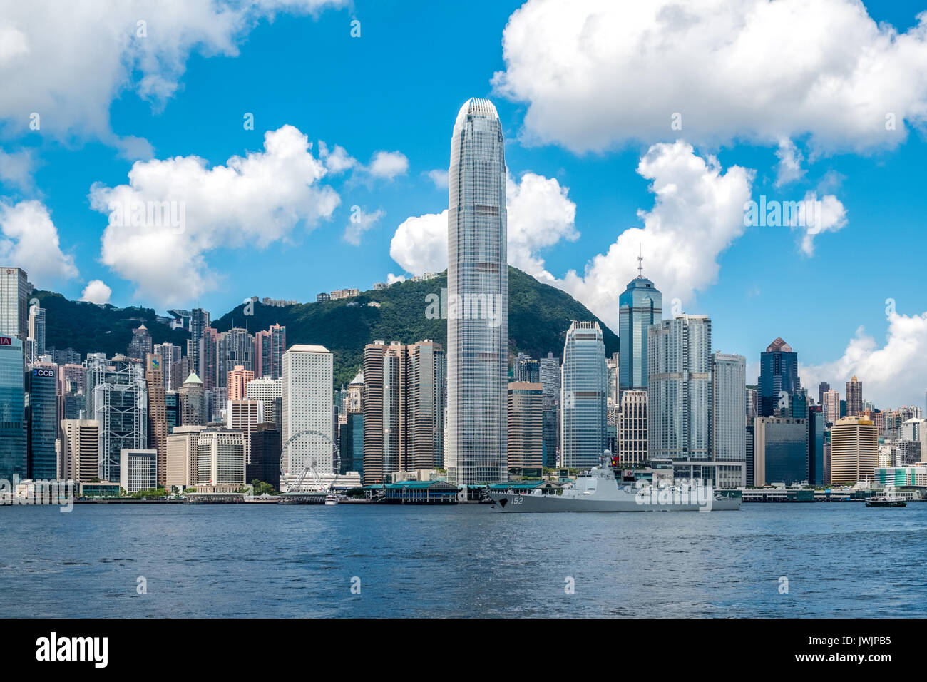 Victoria Harbour, Hong Kong  - June 11, 2017 : Jinan (number 152) missile destroyer acrossed Victoria harbour of Hong Kong returning naval base in mai Stock Photo