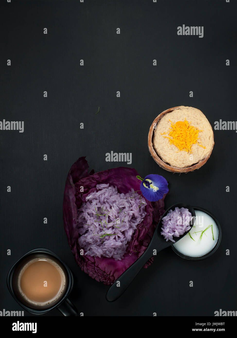Blue pea sticky rice Thai custard with coconut milk thai dessert asian food styling Stock Photo