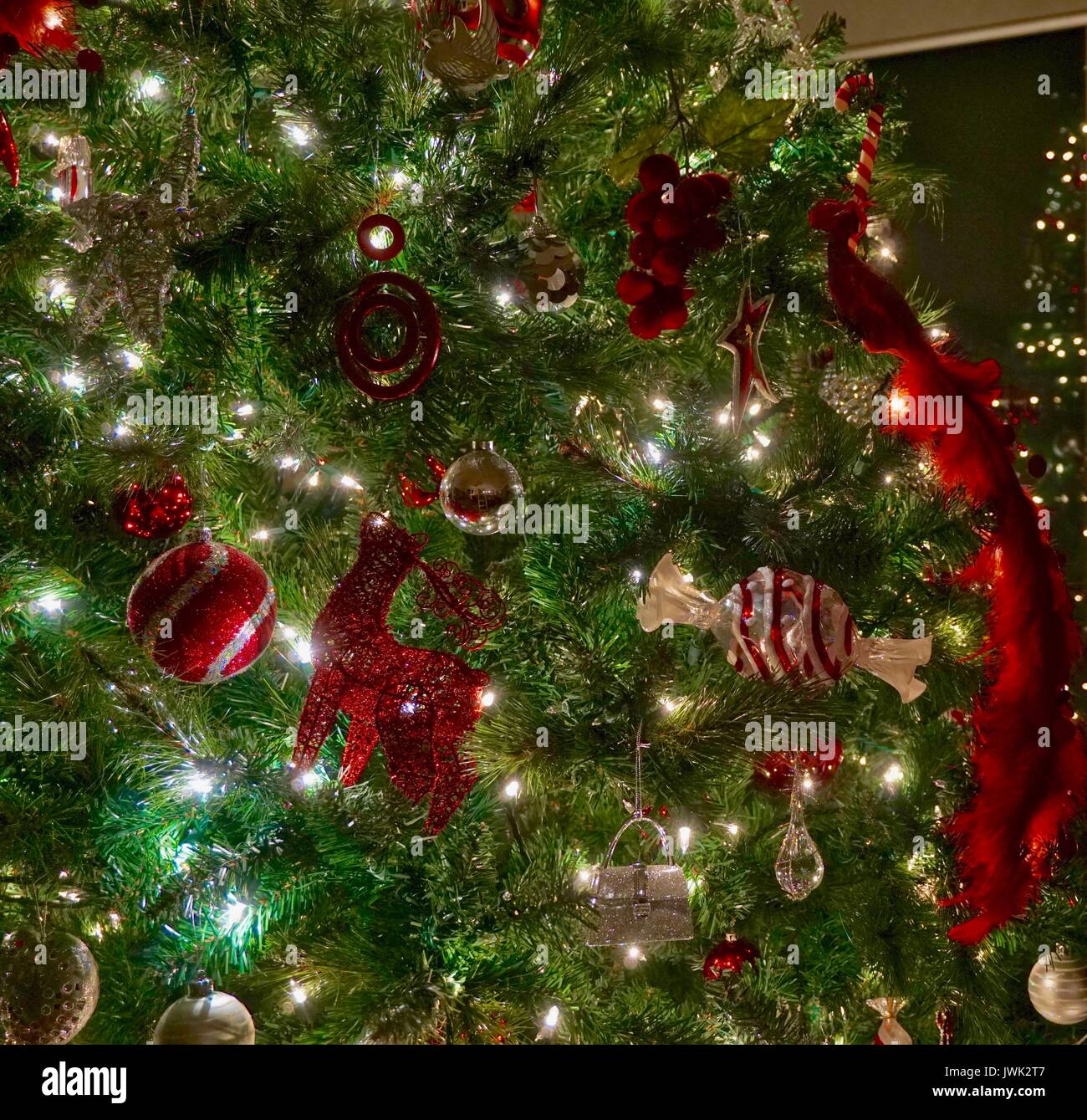 Night time shot of red and silver Christmas tree decorations Stock Image