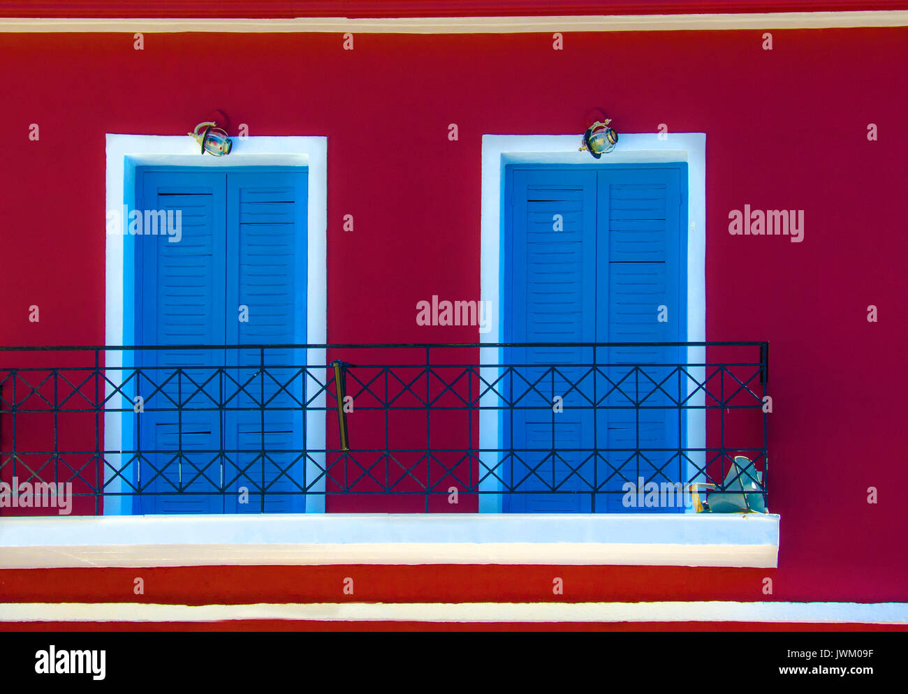 Two doors on red facade Stock Photo