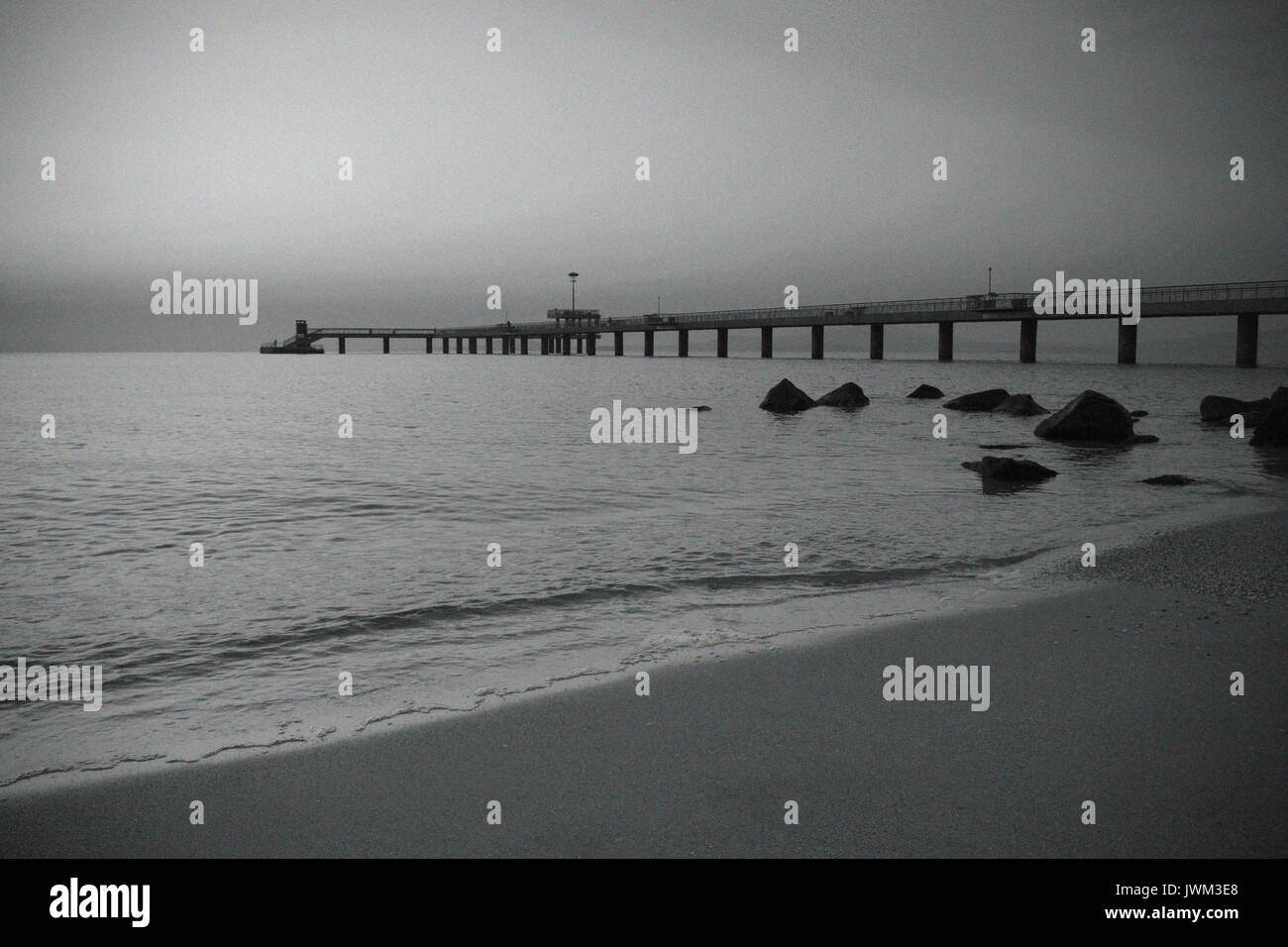 Dark black and white long bridge hi-res stock photography and images ...