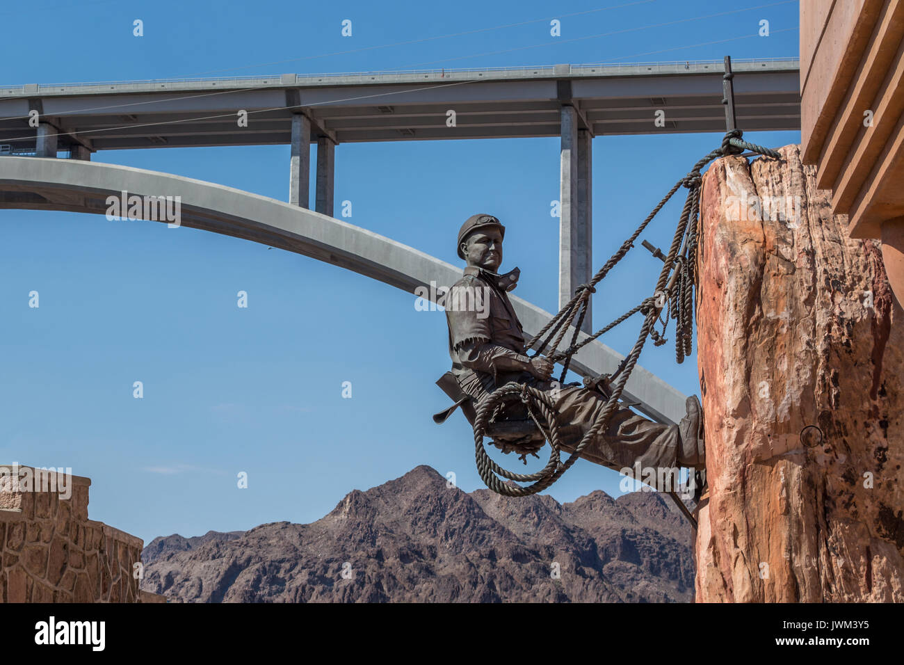 The High Scaler, a bronze figure created in the 1990s by sculptor Steven Liguori installed at the Hoover Dam, Nevada USA. Stock Photo