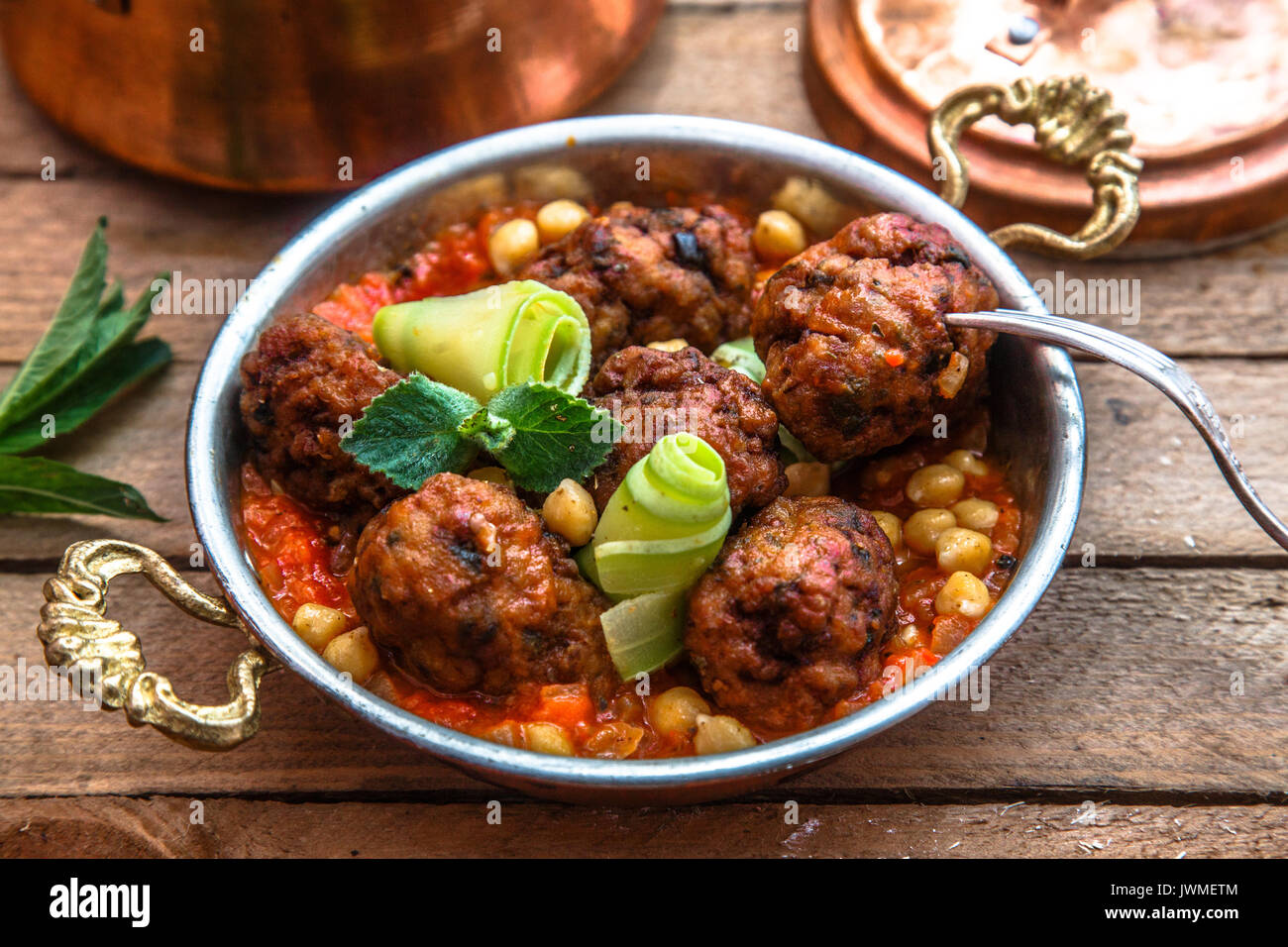 izmir kofte - Turkish traditional meatball with chickpeas. tomato sauce ...