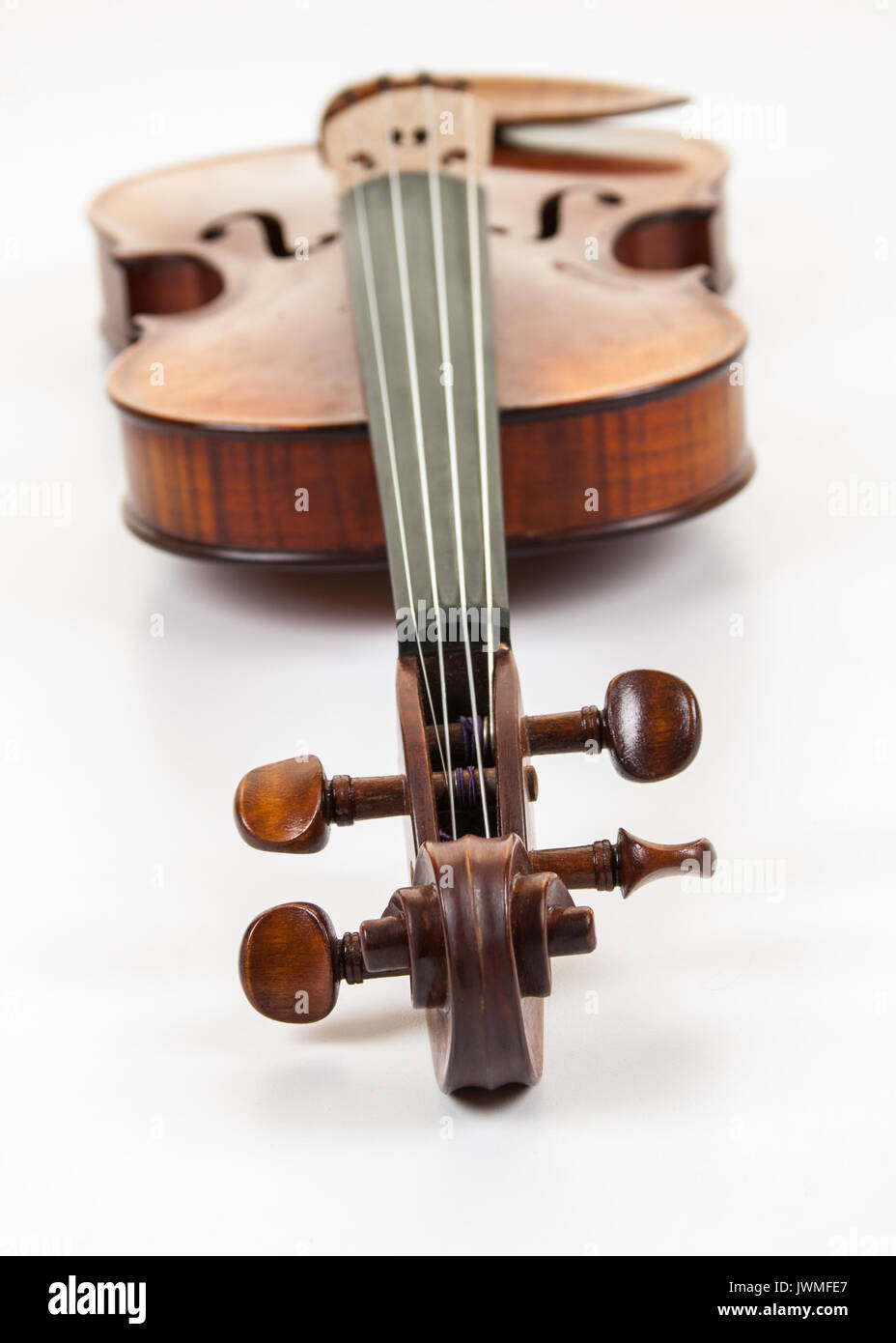 A beautiful fine violin on white surface Stock Photo