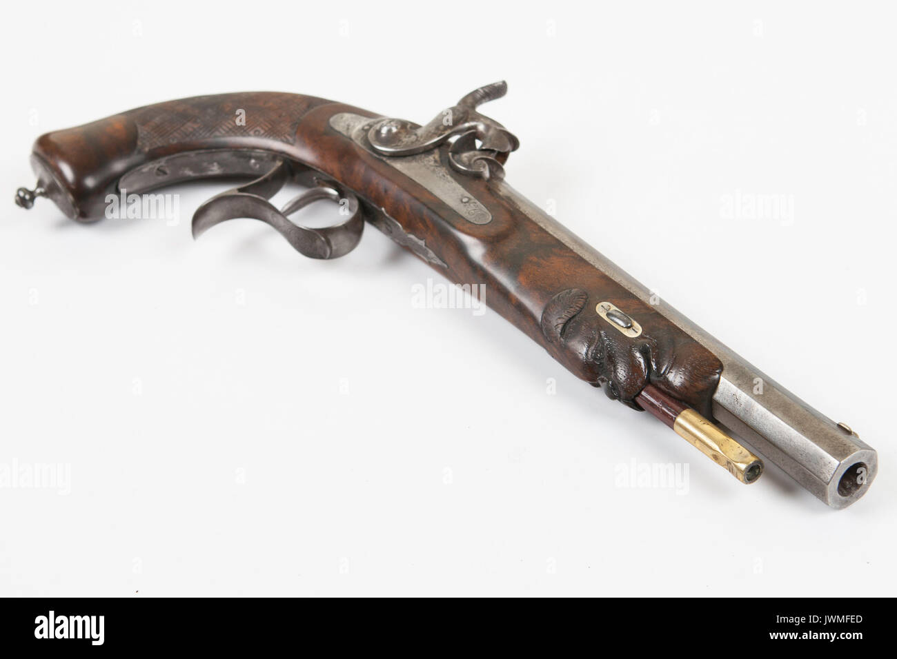 An antique percussion pistol on a white background Stock Photo