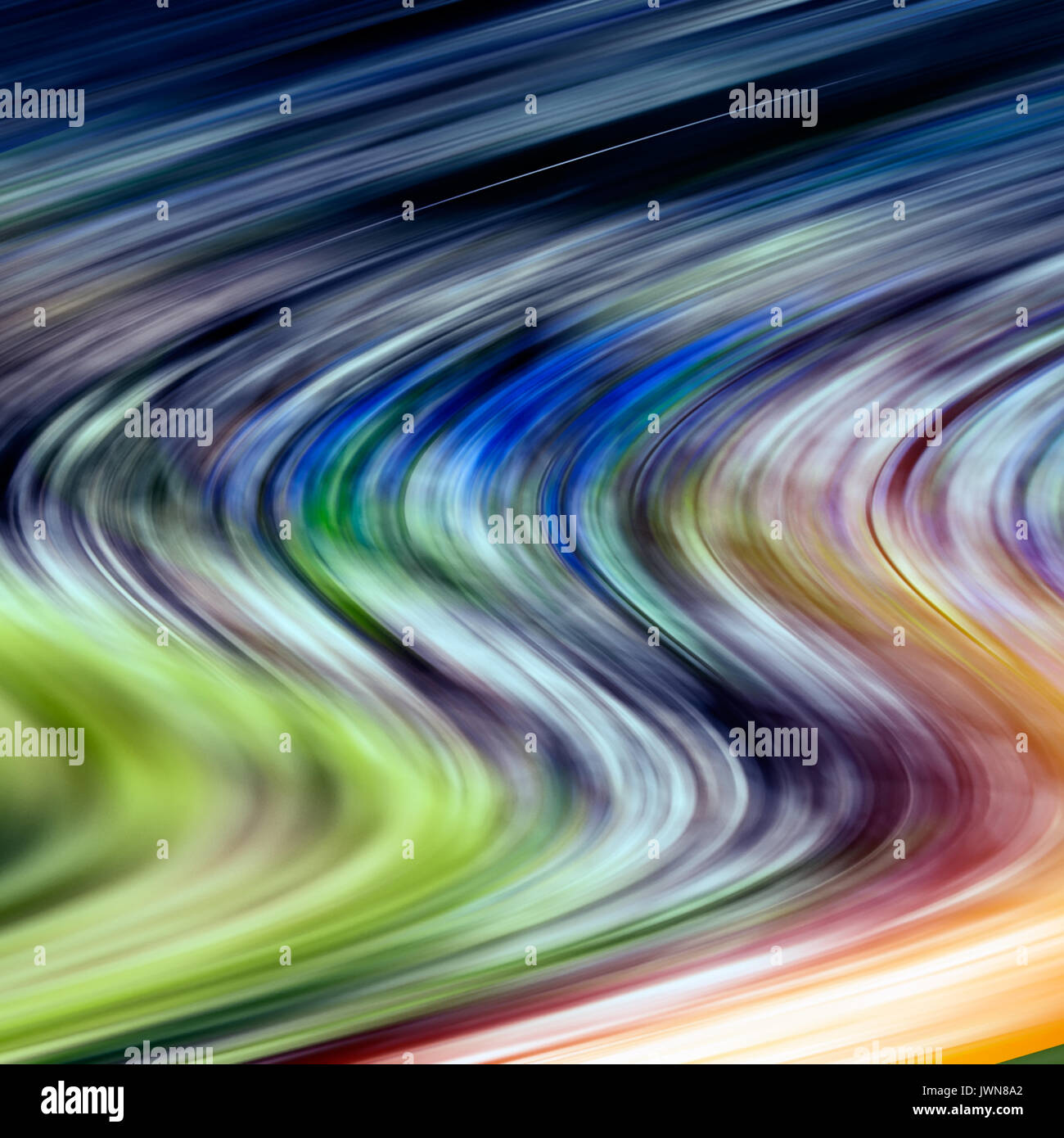 Multicolored blurred curved lines. Stock Photo