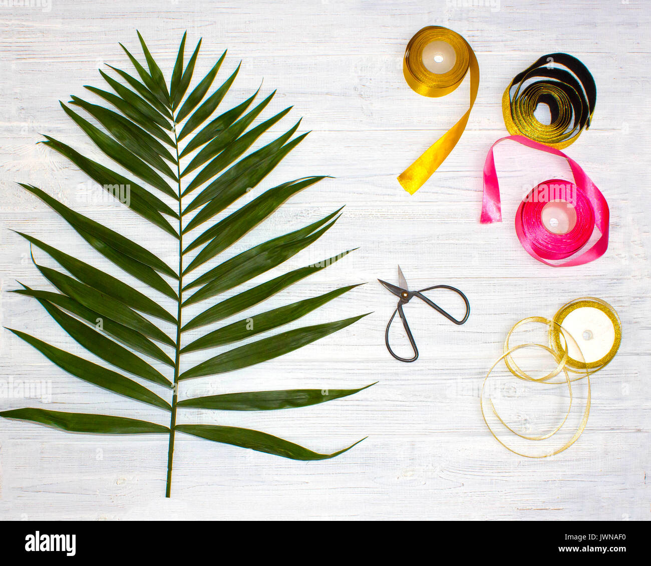The florist desktop with working tools on wooden background Stock Photo
