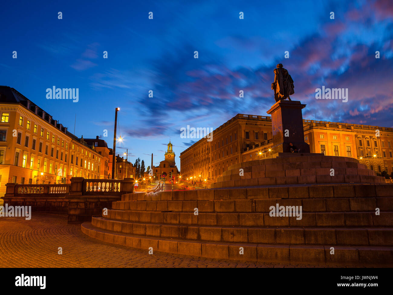 Scenic summer night view of statue and royal palace. Stockholm, Sweden. Stock Photo