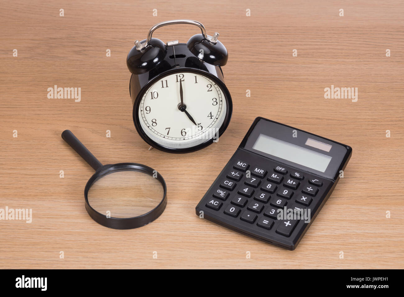 Calculating clock hi-res stock photography and images - Alamy