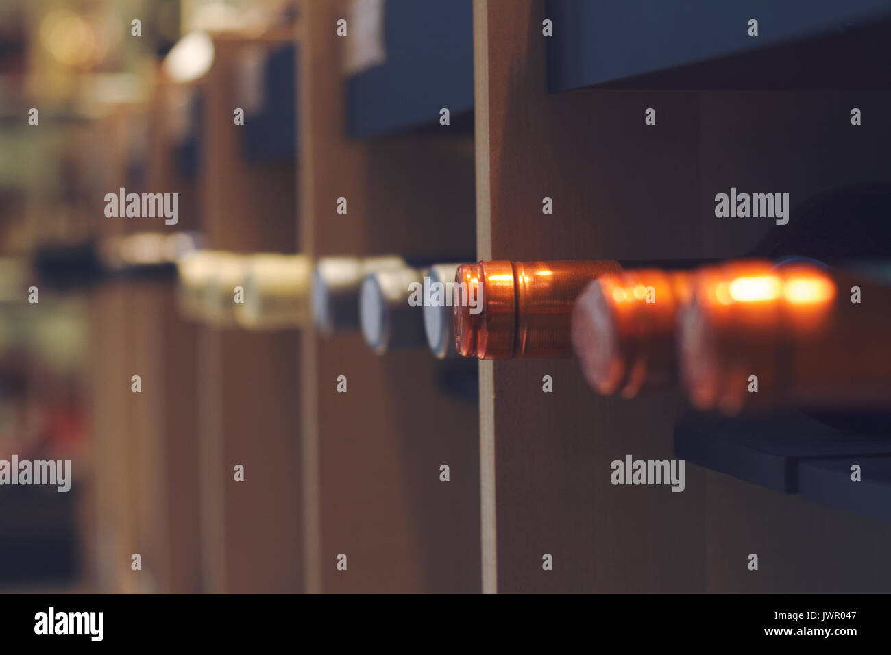 Empty Wine Bottles In Rack High Resolution Stock Photography and Images ...