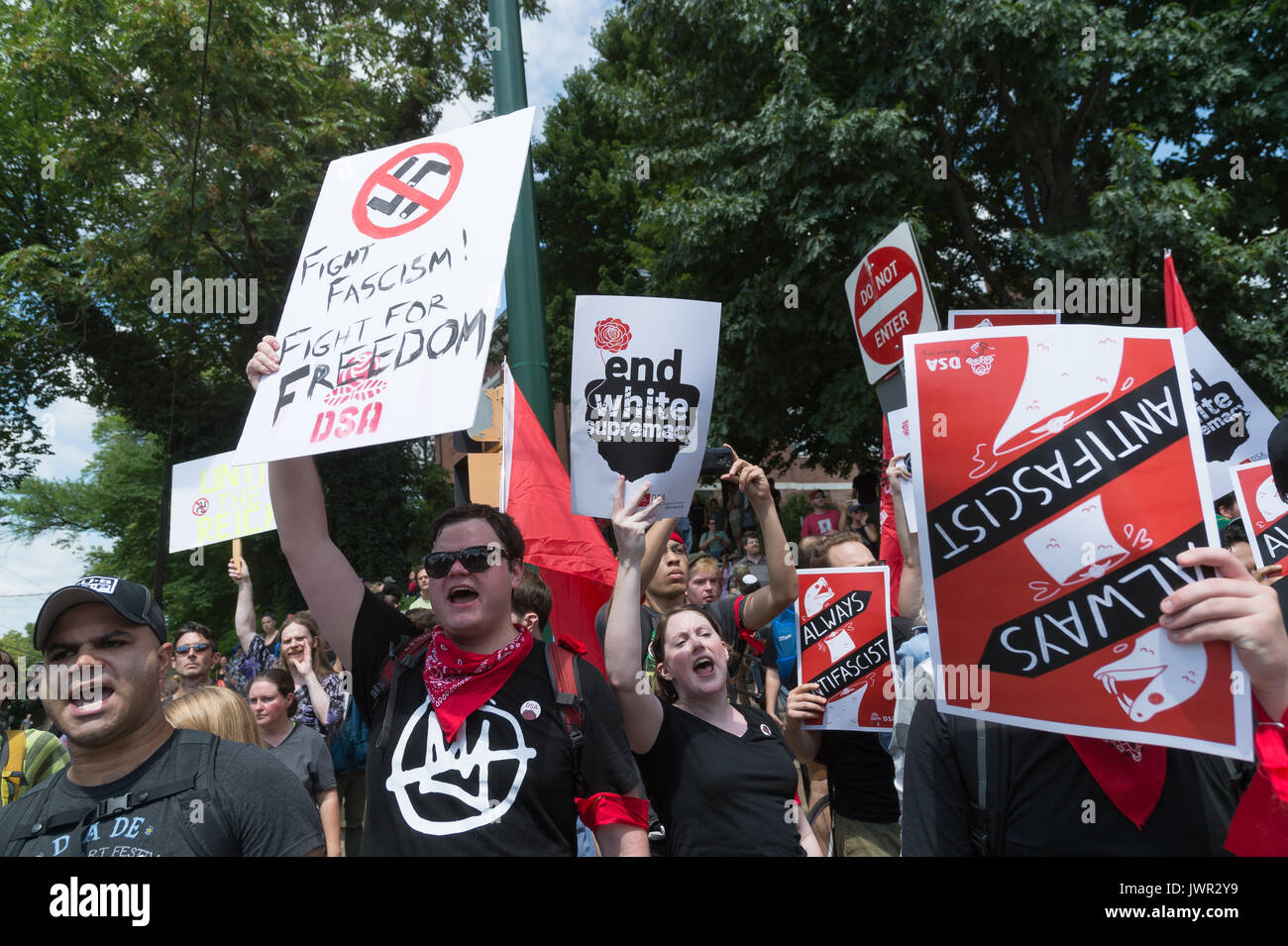 Charlottesville, United States. 12th Aug, 2017. Neo-Nazis, white supremacists and other alt-right factions scuffled with counter-demonstrators near Emancipation Park (Formerly 'Lee Park') in downtown Charlottesville, Virginia. After fighting between factions escalated, Virginia State Police ordered the evacuation by all parties and cancellation of the 'Unite The Right' rally scheduled to take place in the park. Credit: Albin Lohr-Jones/Pacific Press/Alamy Live News Stock Photo