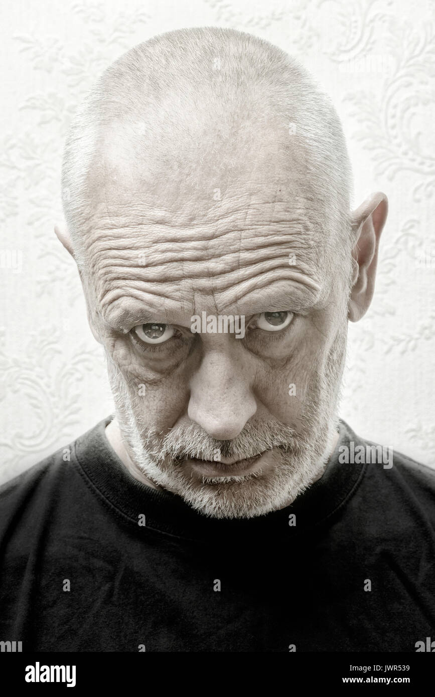 Black and white portrait of a serious adult caucasian man with an inquisitive look Stock Photo