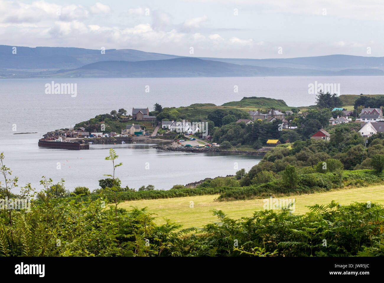view looking down to Carradale, Scotland with views towards Isle of Arran Stock Photo