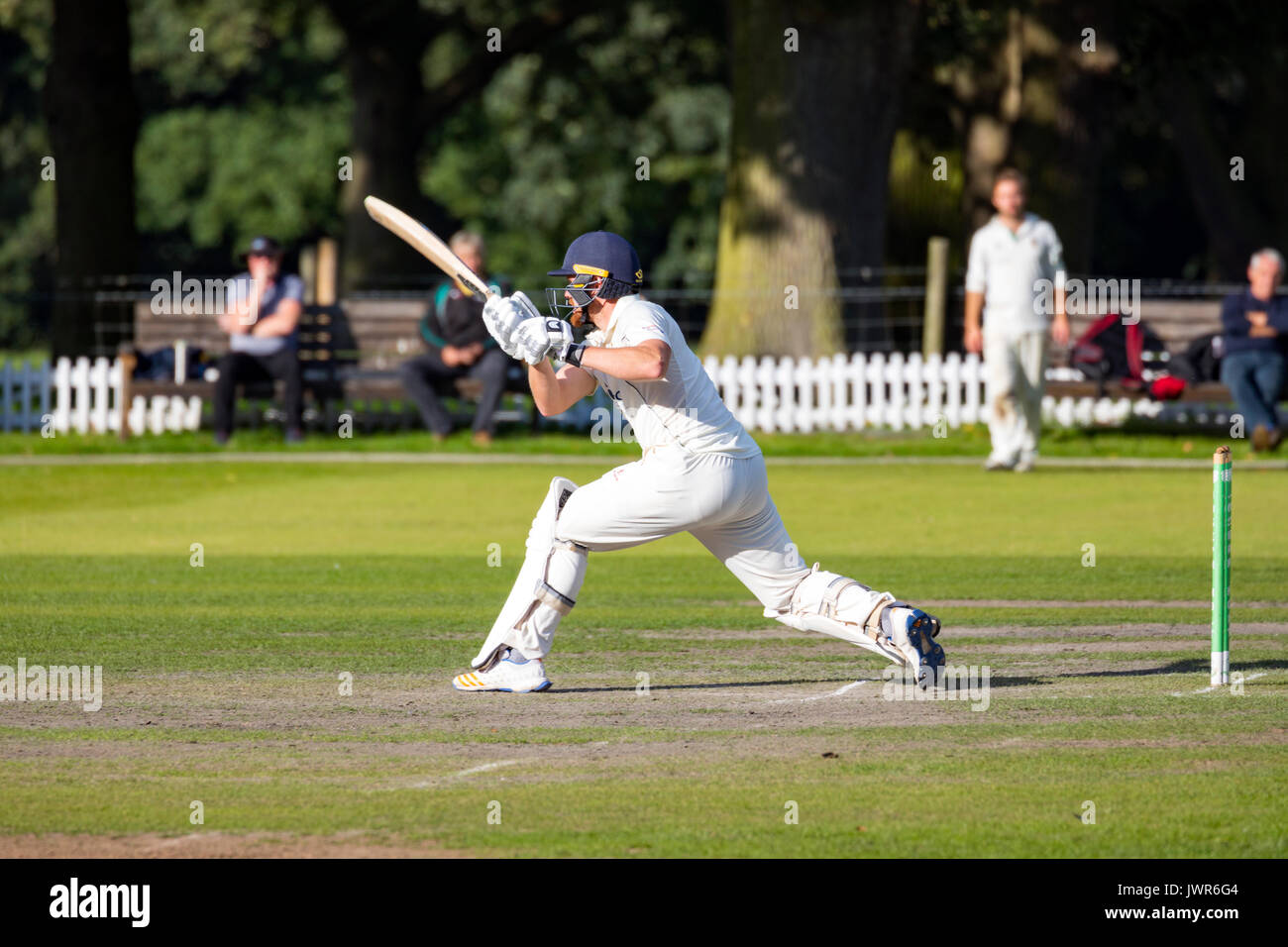 A summer evening of cricket at Toft Cricket Club at Bootes Park, Knutsford, Cheshire during a game of cricket Stock Photo