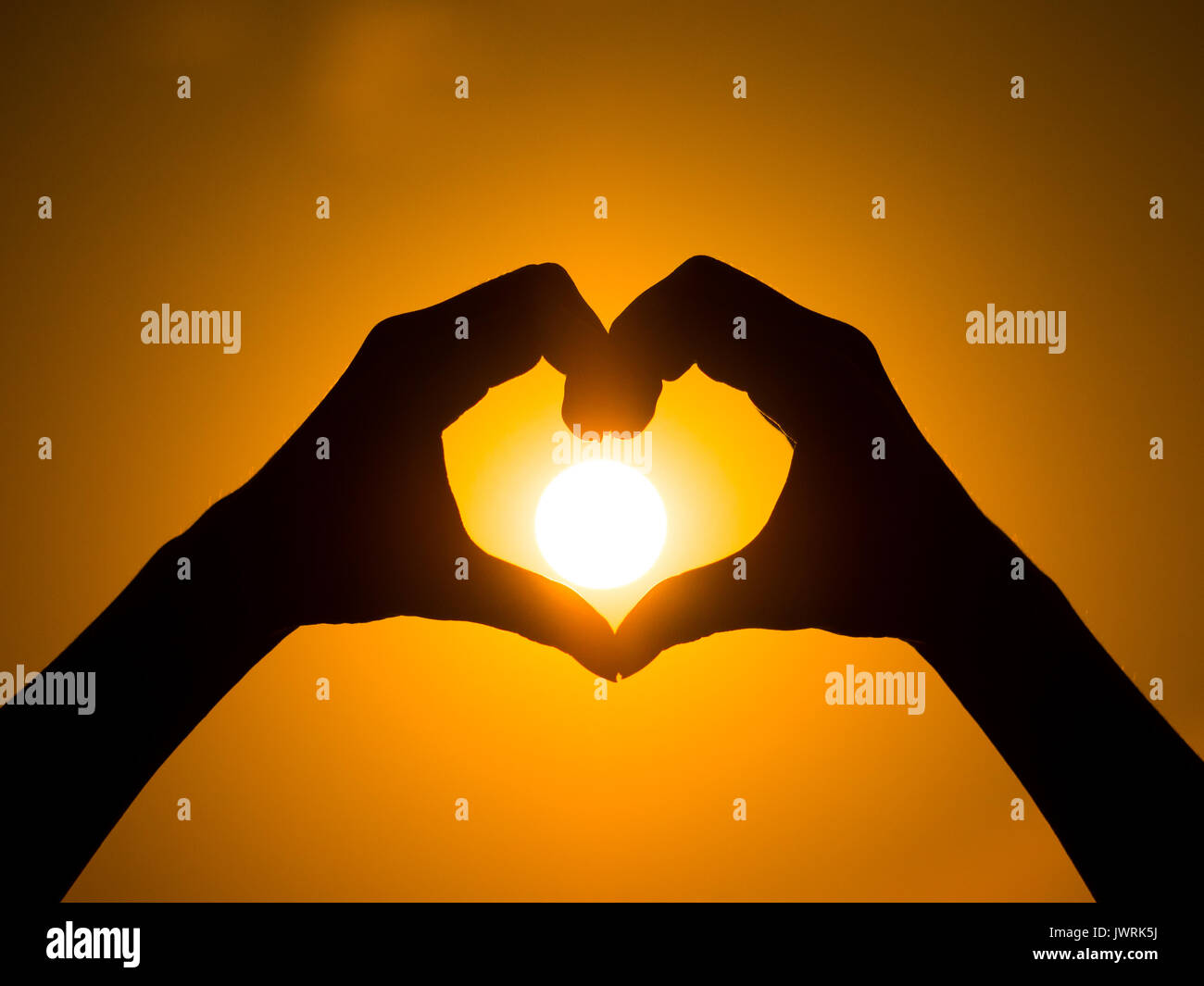 Heart made hands silhouette hi-res stock photography and images - Alamy