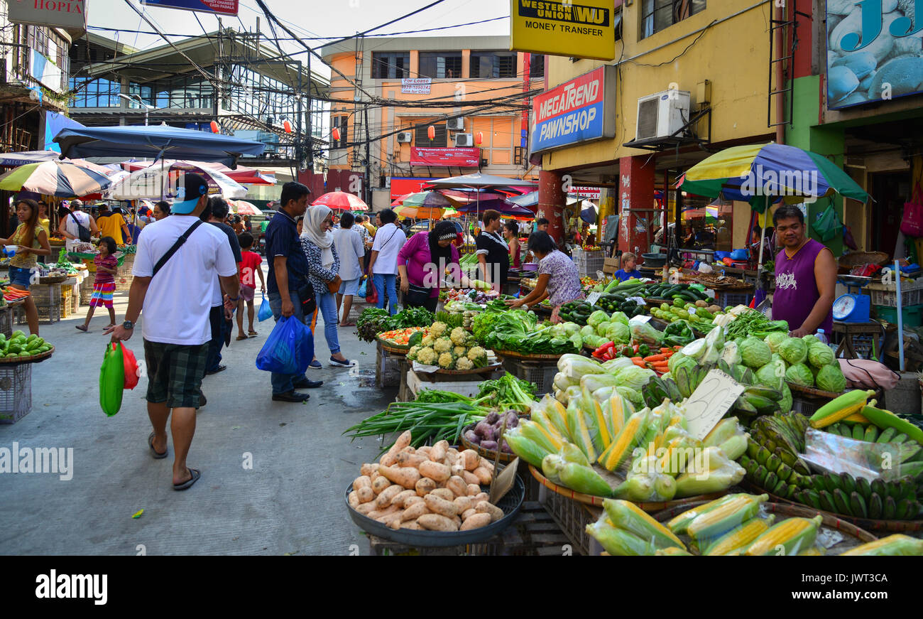 Manila, Philippines - Apr 12, 2017. People at street market in Stock