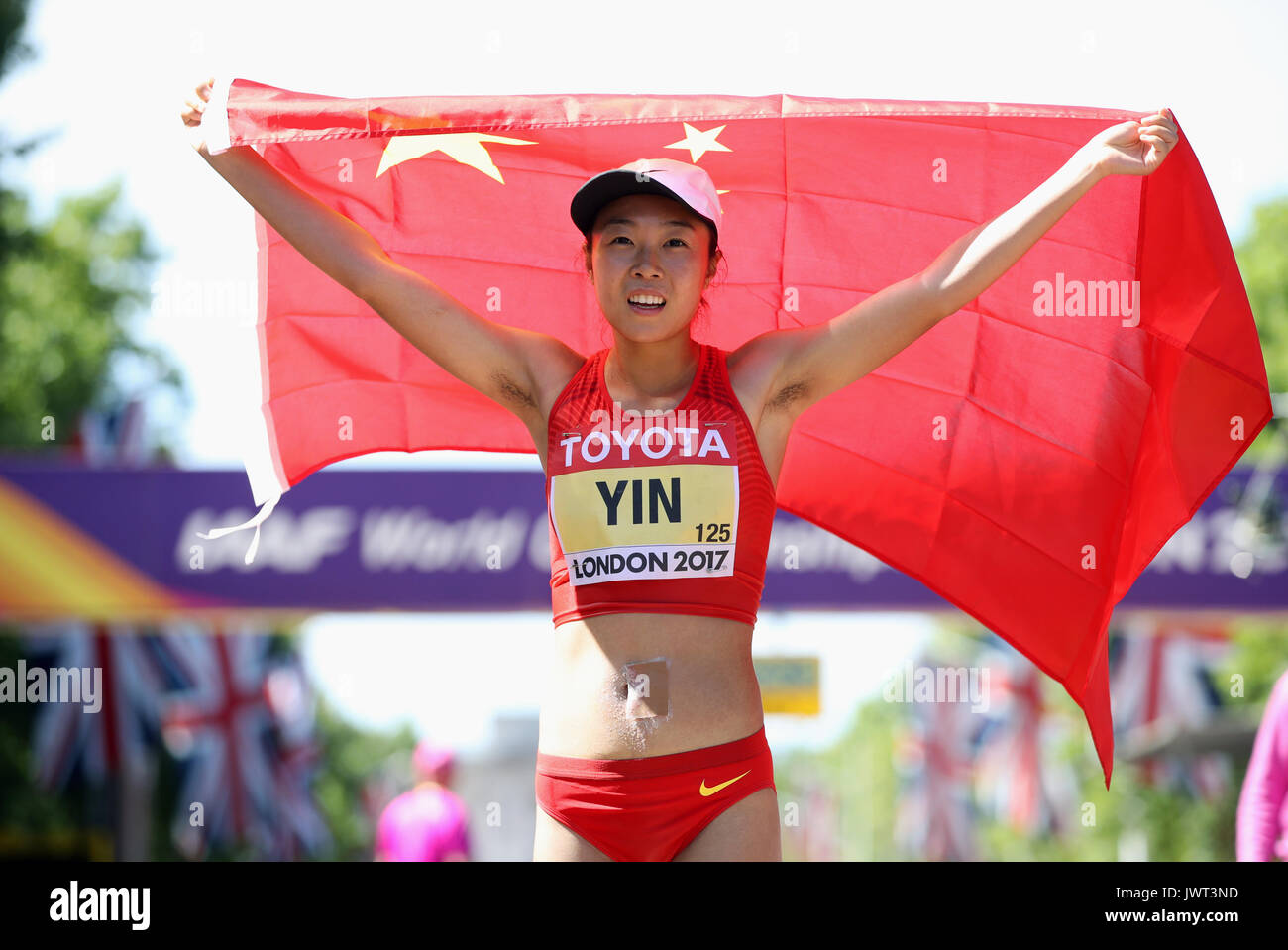 China's Hang Yin celebrates finishing second in the Women's 50km Race ...