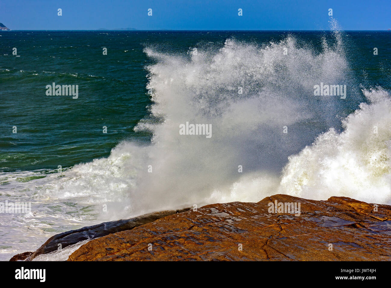 Big, dangerous waves during tropical storm in the green and blue waters ...