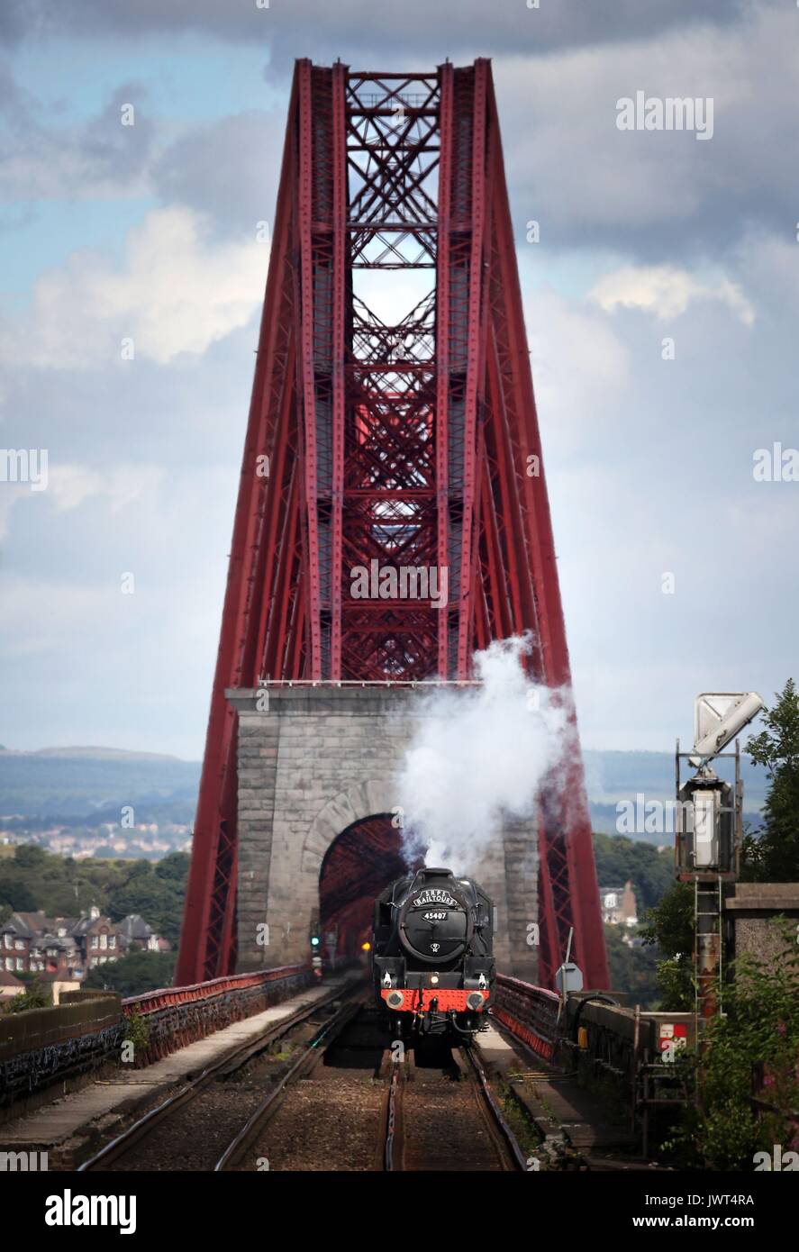 STANDALONE Photo. The LMS Stanier Black Five steam locomotive travels across the Forth Bridge, Dalmeny, near Edinburgh. Stock Photo