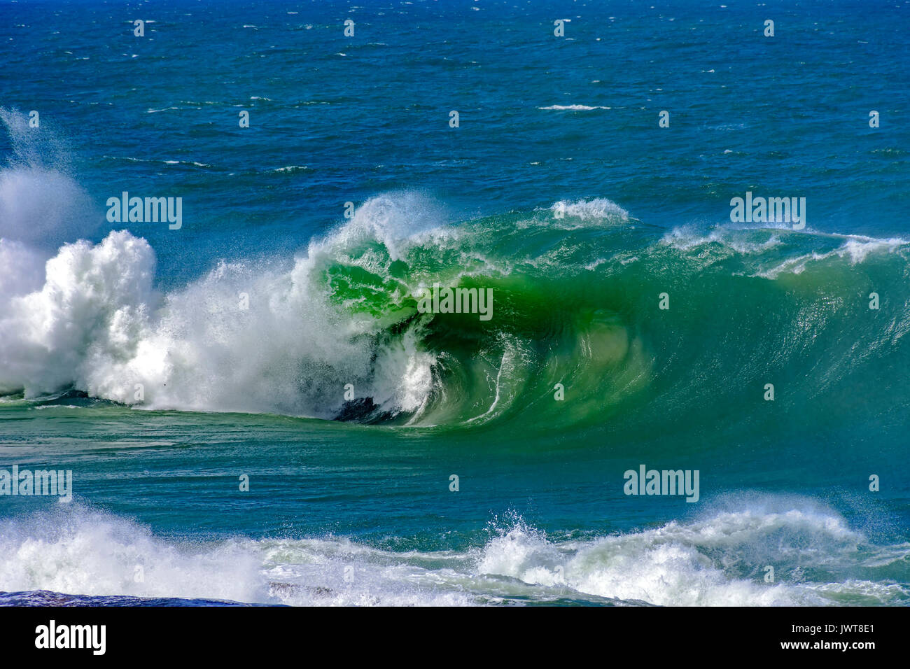 Big, dangerous waves during tropical storm in the green and blue waters ...