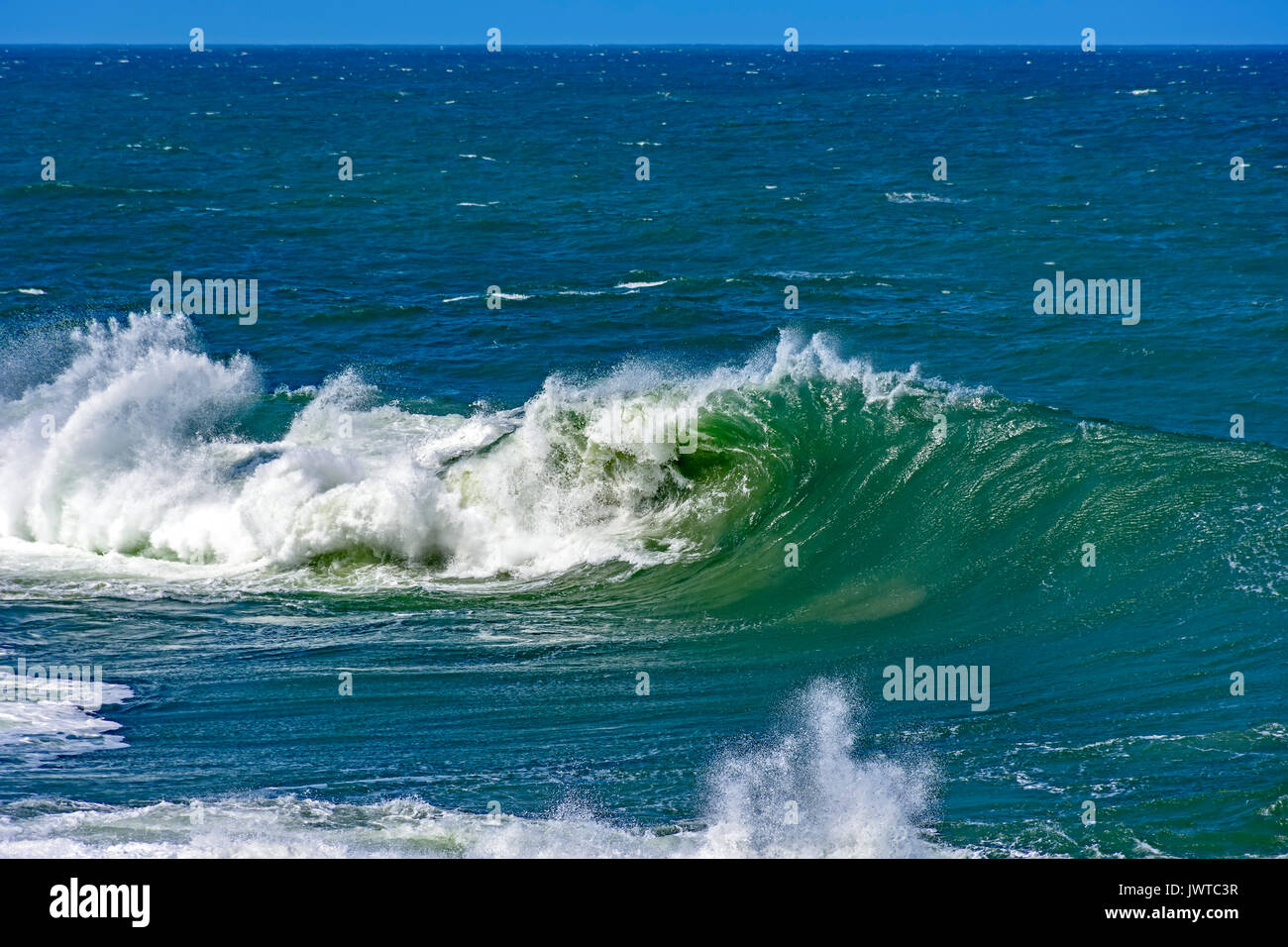 Big, dangerous waves during tropical storm in the green and blue waters ...