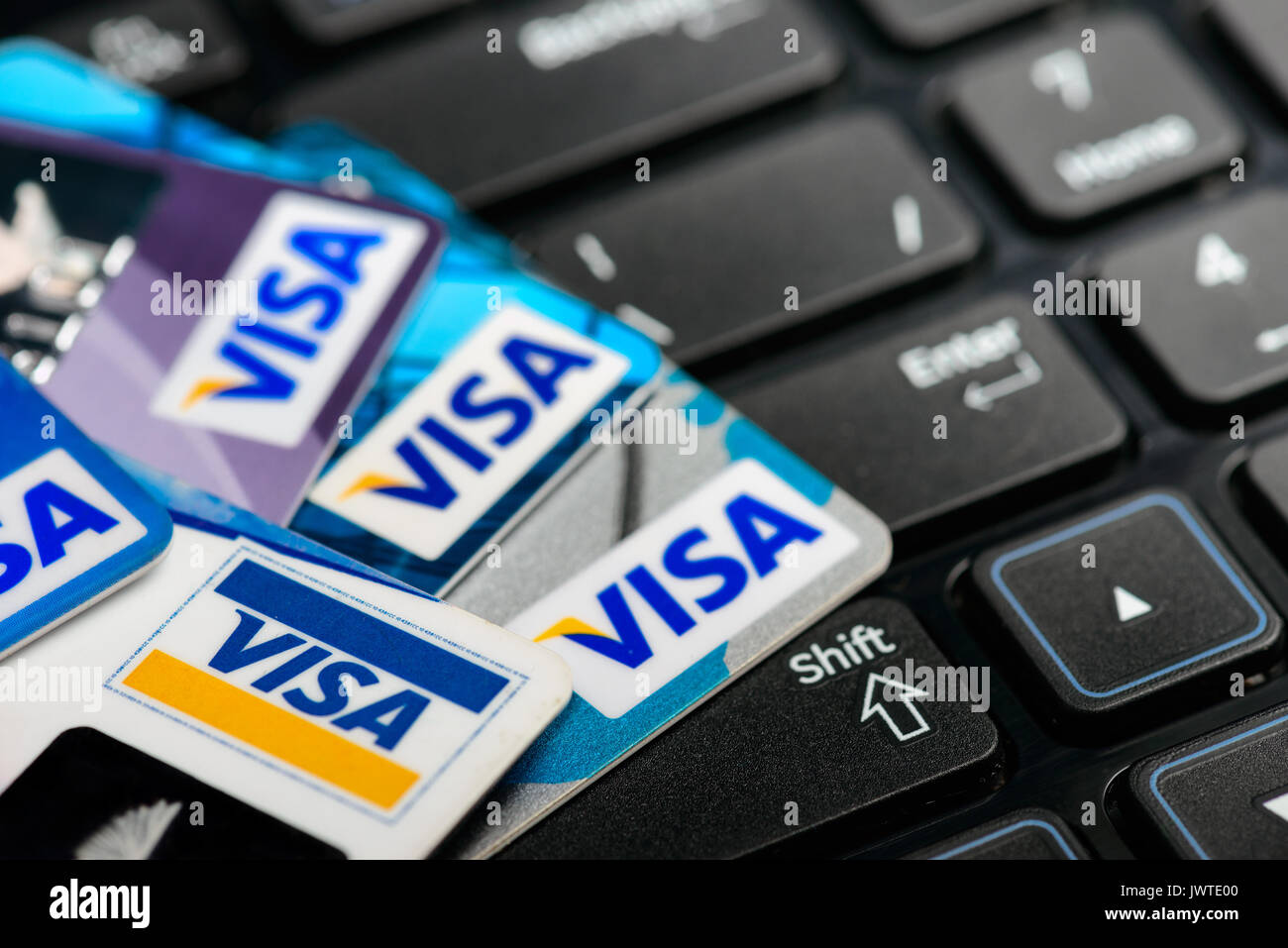 Moscowi, Russia - August 05, 2017: Visa credit cards onr notebook keyboard Stock Photo
