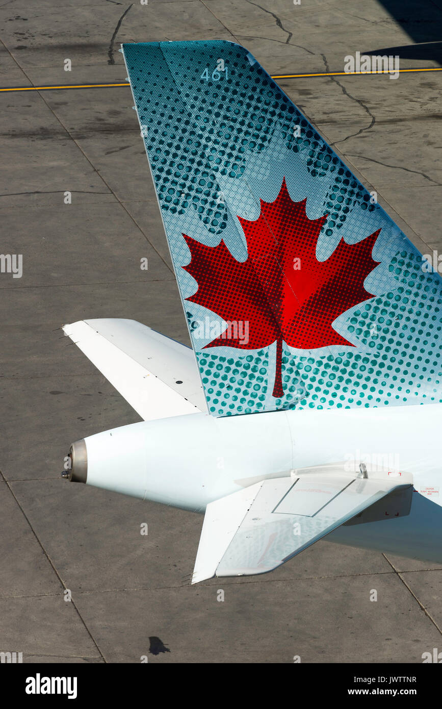 Tail Section of Air Canada Airline Airbus A321-211 Airliner C-FGKN On Stand at Calgary International Airport Alberta Canada Stock Photo