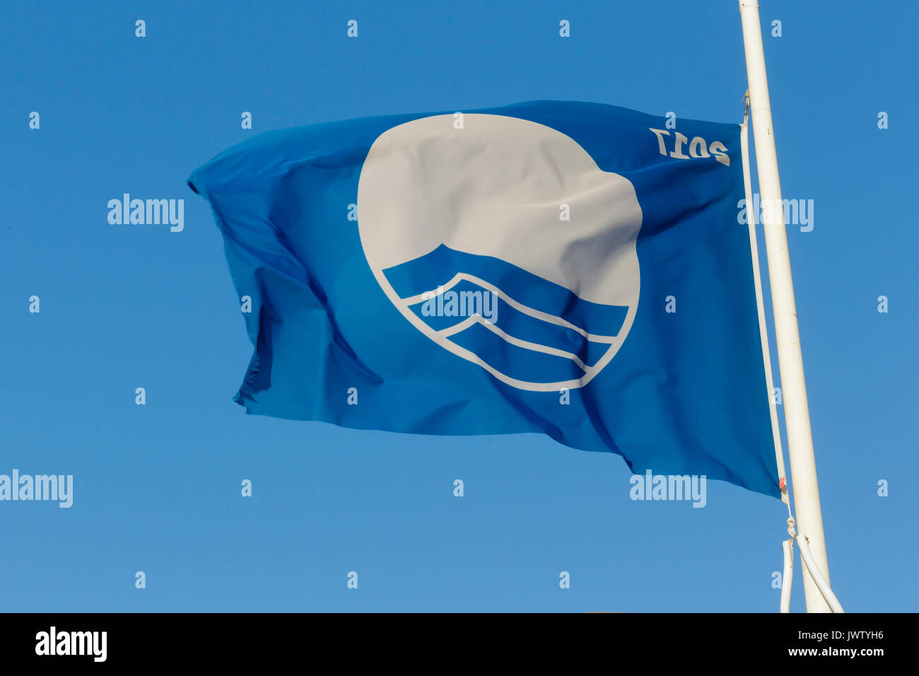 Blue Flag beach flag, Withernsea promenade, East Yorkshire, England, August Stock Photo Alamy