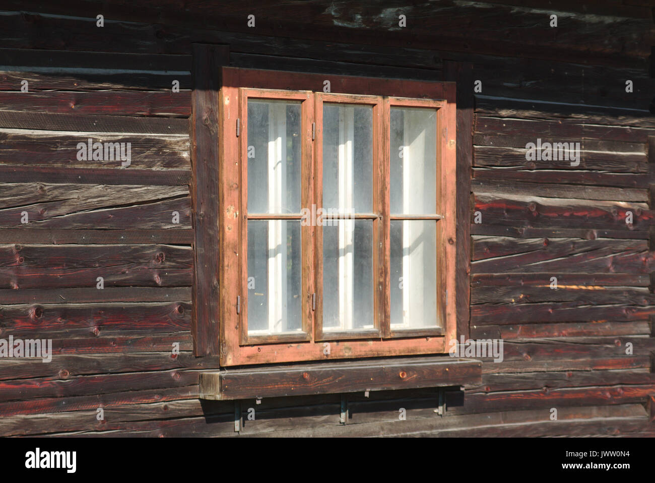 Window of a log house in Orava (Slovakia) Stock Photo