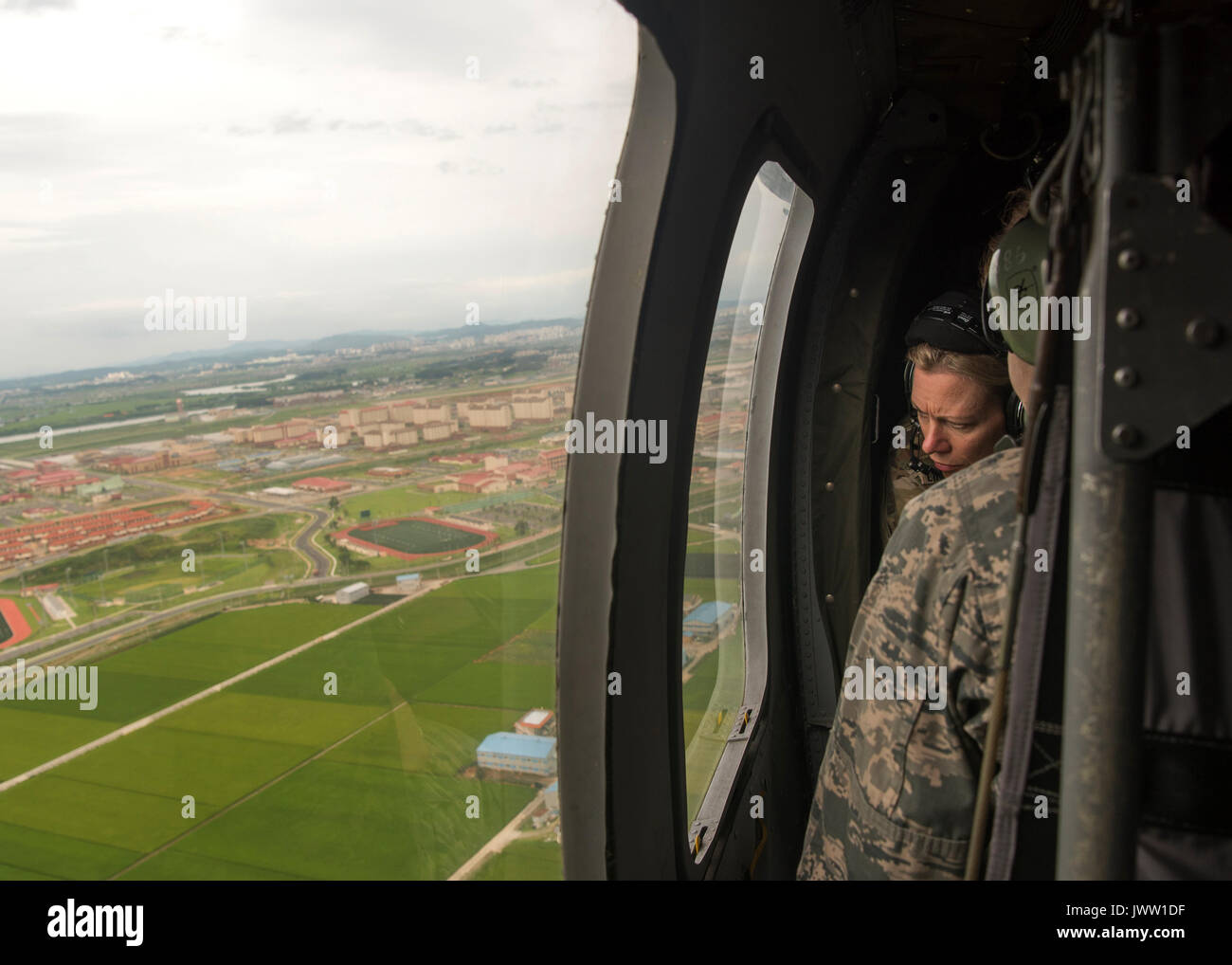 U.S. Army Col. Abigail Linnington, director of the CJCS Action Group participates in an aerial tour of Camp Humphreys August 13, 2017 in Pyeongtaek, Gyeonggi-do, South Korea. Dunford is meeting military leaders in the Asia-Pacific region as tensions rise with North Korea over nuclear and ballistic missiles tests. Stock Photo