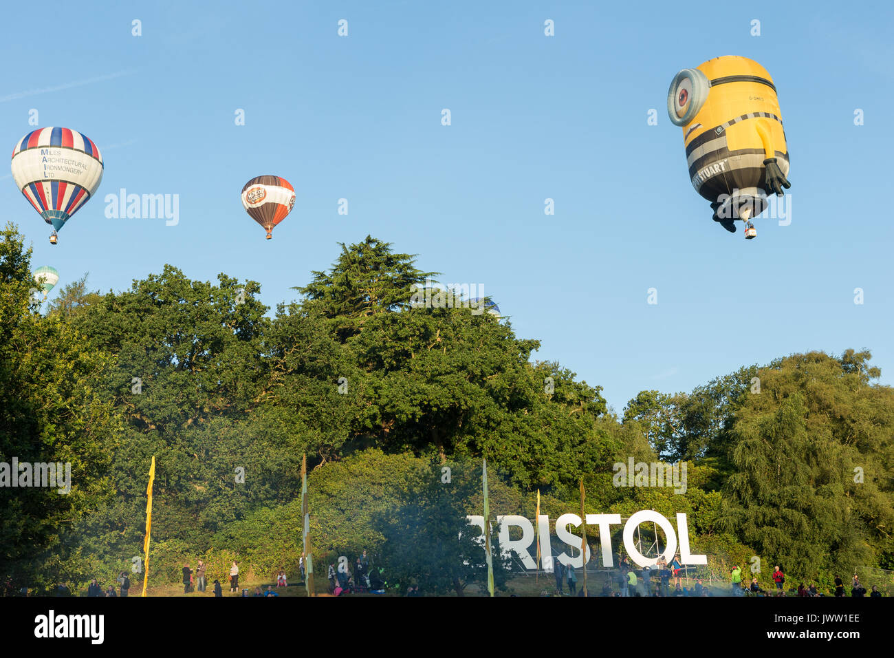 Ashton Court, Bristol, UK. 13 August 2017. The third successful mass ascent sees 111 hot air balloons launch from this year’s Bristol International Balloon Fiesta. After high winds on Saturday evening, the weather was much improved to almost perfect hot air ballooning conditions which allowed a spectacular mass ascent. The skies were filled with lots of beautiful coloured hot air balloons including a number of special shapes like the minion balloon. Credit: Neil Cordell/Alamy Live News Stock Photo