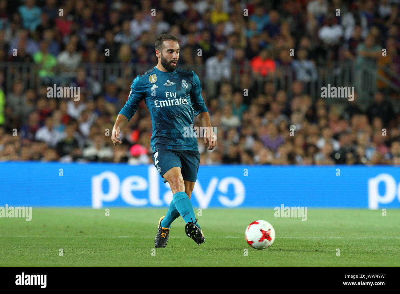 Carvajal in action during Supercopa de Espa–a game 1 between FC Barcelona against Real Madrid at Camp Nou Stock Photo