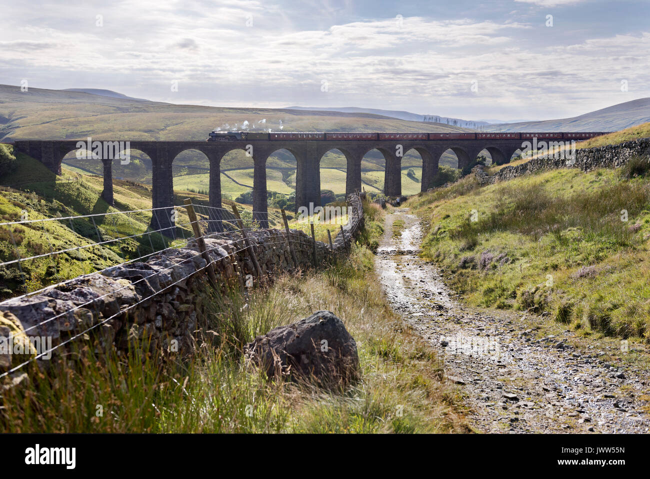 The Flying Scotman steam locomotive hauls 'The Waverley' special train over Arten Gill viaduct on the Settle-Carlisle railway line in the Yorkshire Dales National Park, travelling from Carlisle back to York. Credit: John Bentley/Alamy Live News Stock Photo