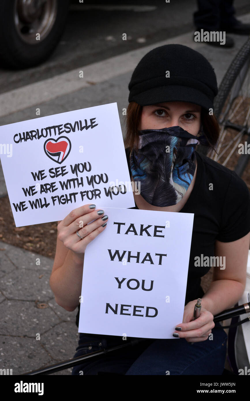Charlottesville, USA. 13th Aug, 2017. People gathered in Union Square to denounce President Trump and the neo-nazi violence in Charlottesville, Virginia in New York City. Credit: Christopher Penler/Alamy Live News Stock Photo