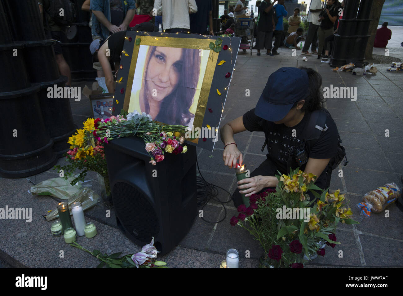 Atlanta, GA, USA. 13th Aug, 2017. Anti-Fascist protestors gather in downtown Atlanta and march along Peachtree Street, showing their support of those who demonstrated against white supremacist group in Charlottesville, VA. Rally organized by Antifa, an organization nationally that fights fascism.Pictured: Portrait of Charlottesville victim Heather Heyer at impromptu memorial Credit: Robin Rayne Nelson/ZUMA Wire/Alamy Live News Stock Photo