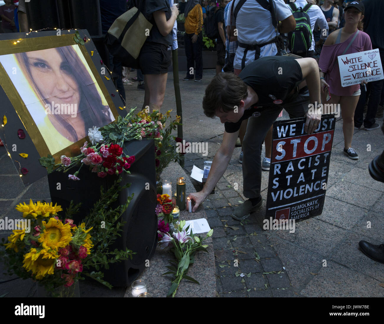 Atlanta, GA, USA. 13th Aug, 2017. Anti-Fascist protestors gather in downtown Atlanta and march along Peachtree Street, showing their support of those who demonstrated against white supremacist group in Charlottesville, VA. Rally organized by Antifa, an organization nationally that fights fascism.Pictured: Portrait of Charlottesville victim Heather Heyer at impromptu memorial Credit: Robin Rayne Nelson/ZUMA Wire/Alamy Live News Stock Photo