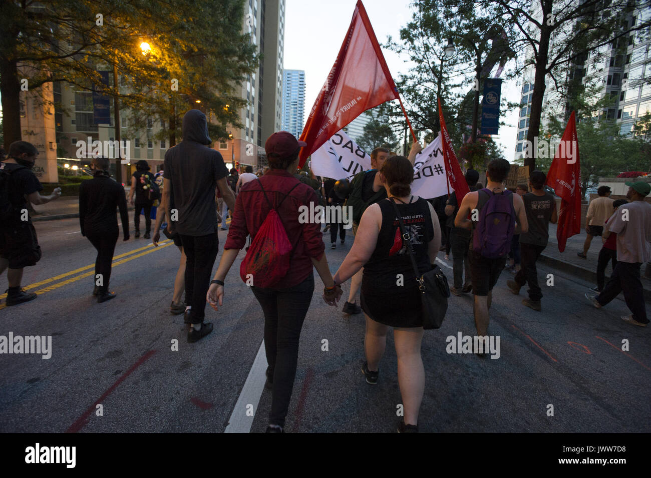 Atlanta, GA, USA. 13th Aug, 2017. Anti-Fascist protestors gather in downtown Atlanta and march along Peachtree Street, showing their support of those who demonstrated against white supremacist group in Charlottesville, VA. Rally organized by Antifa, an organization nationally that fights fascism.Pictured: Demonstrators march down Peachtree Street, obstructing traffic. Credit: Robin Rayne Nelson/ZUMA Wire/Alamy Live News Stock Photo