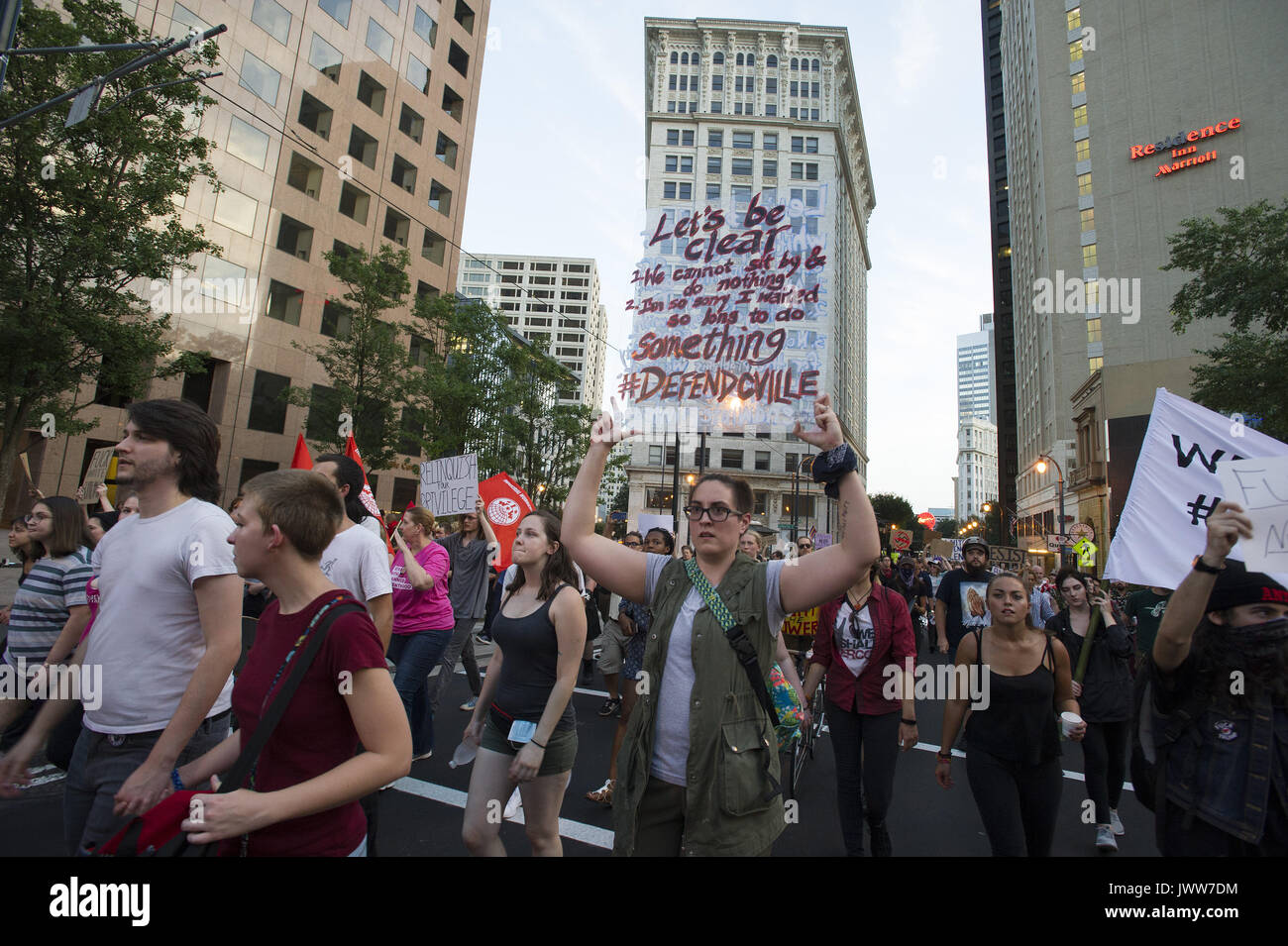 Atlanta, GA, USA. 13th Aug, 2017. Anti-Fascist protestors gather in downtown Atlanta and march along Peachtree Street, showing their support of those who demonstrated against white supremacist group in Charlottesville, VA. Rally organized by Antifa, an organization nationally that fights fascism.Pictured: Demonstrators march down Peachtree Street, obstructing traffic. Credit: Robin Rayne Nelson/ZUMA Wire/Alamy Live News Stock Photo