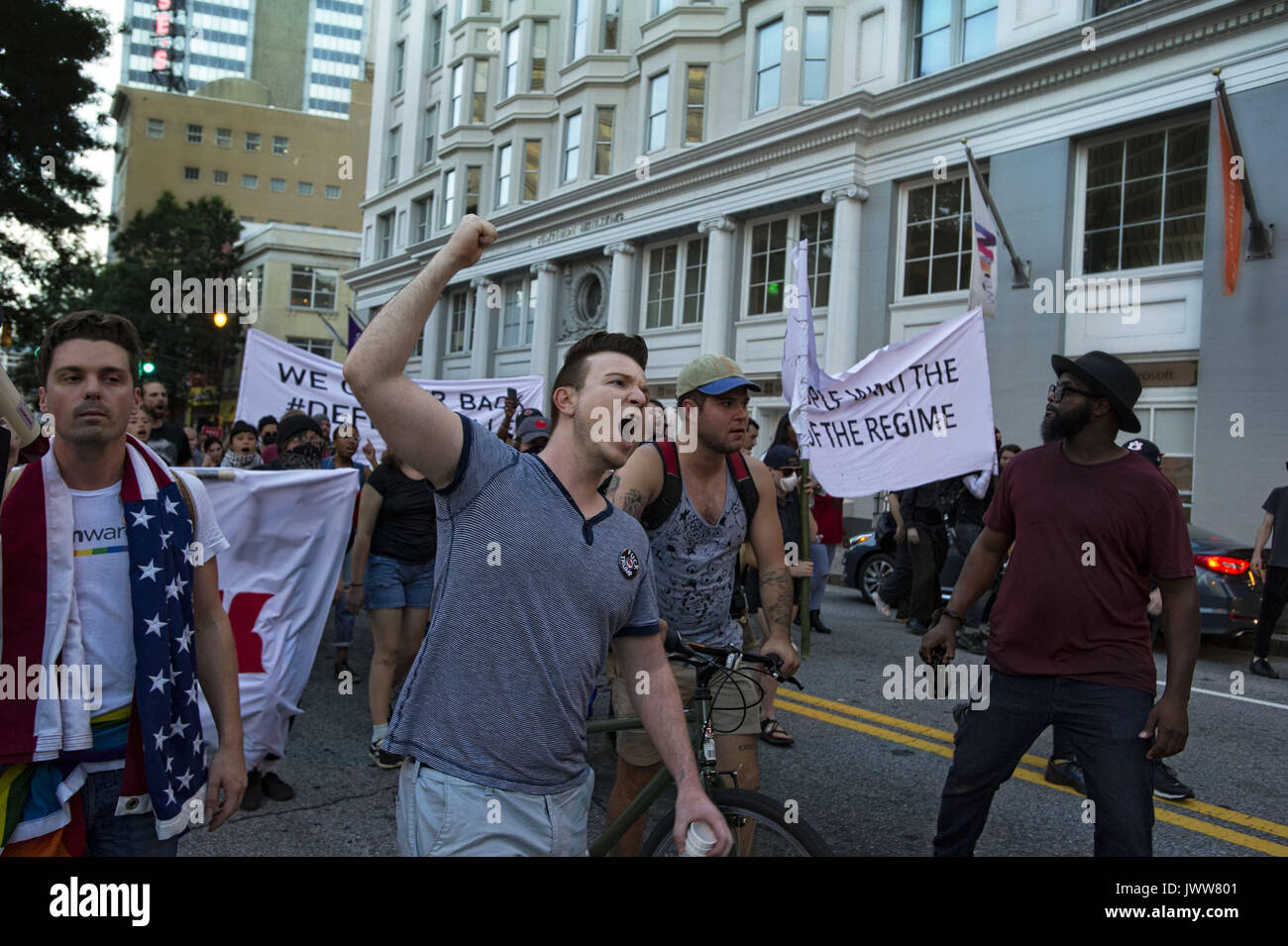 Atlanta, GA, USA. 13th Aug, 2017. Anti-Fascist protestors gather in downtown Atlanta and march along Peachtree Street, showing their support of those who demonstrated against white supremacist group in Charlottesville, VA. Rally organized by Antifa, an organization nationally that fights fascism.Pictured: Ã–March down Peachtree St Credit: Robin Rayne Nelson/ZUMA Wire/Alamy Live News Stock Photo