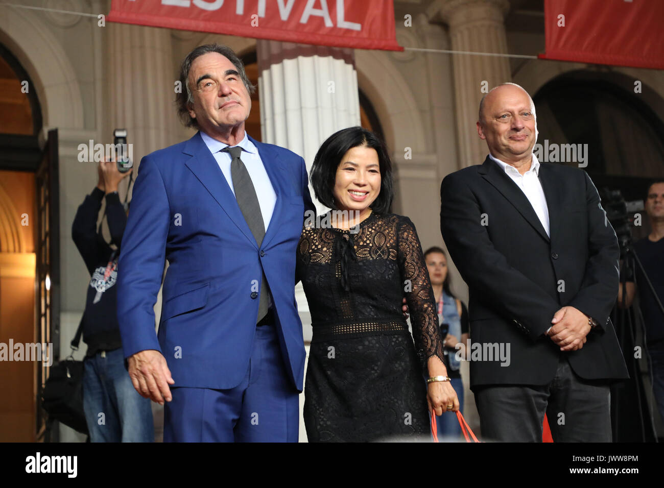 Sarajevo, Bosnia and Herzegovina. 13th Aug, 2017. Famous U.S. film director Oliver Stone (L) and the festival director Mirsad Purivatra (R) pose for a photo on the red carpet during the 23rd Sarajevo Film Festival(SFF) in Sarajevo, Bosnia and Herzegovina, on Aug. 13, 2017. Oliver Stone received Honorary Heart of Sarajevo on the festival for his remarkable contribution to the art of film. Credit: Haris Memija/Xinhua/Alamy Live News Stock Photo