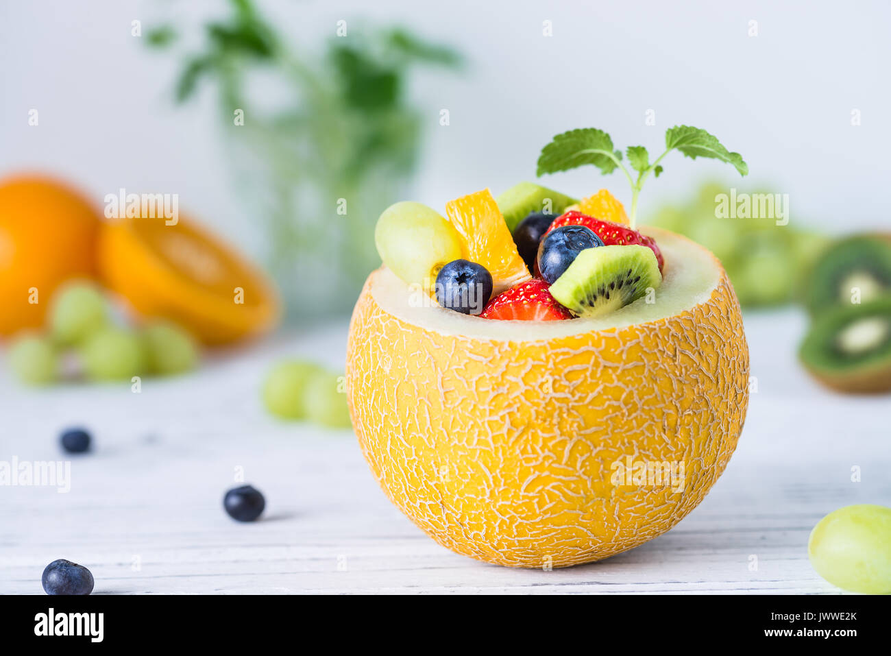 Fruit salad in melon slice hi-res stock photography and images - Alamy