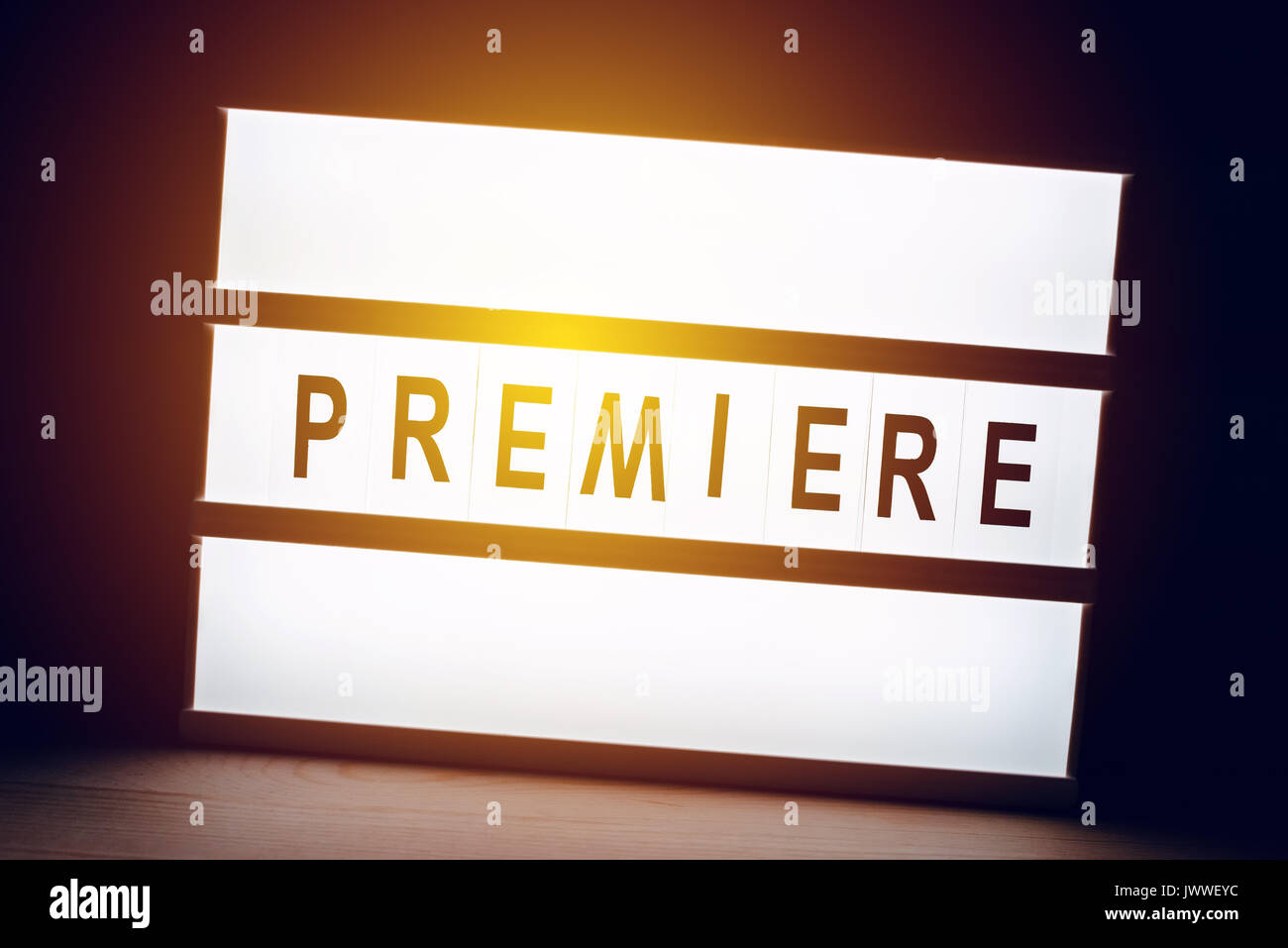 Vintage illuminated lightbox Premiere sign in cinema movie or for radio and television live audience broadcast Stock Photo