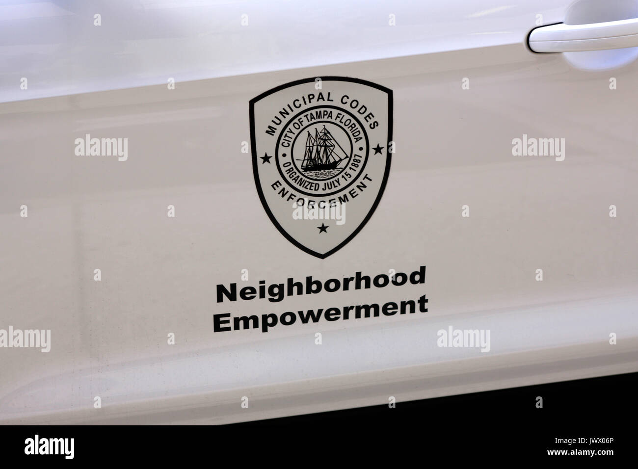Municipal Codes Enforcement Neighborhood Empowerment vehicle door sign in Tampa FL, USA Stock Photo