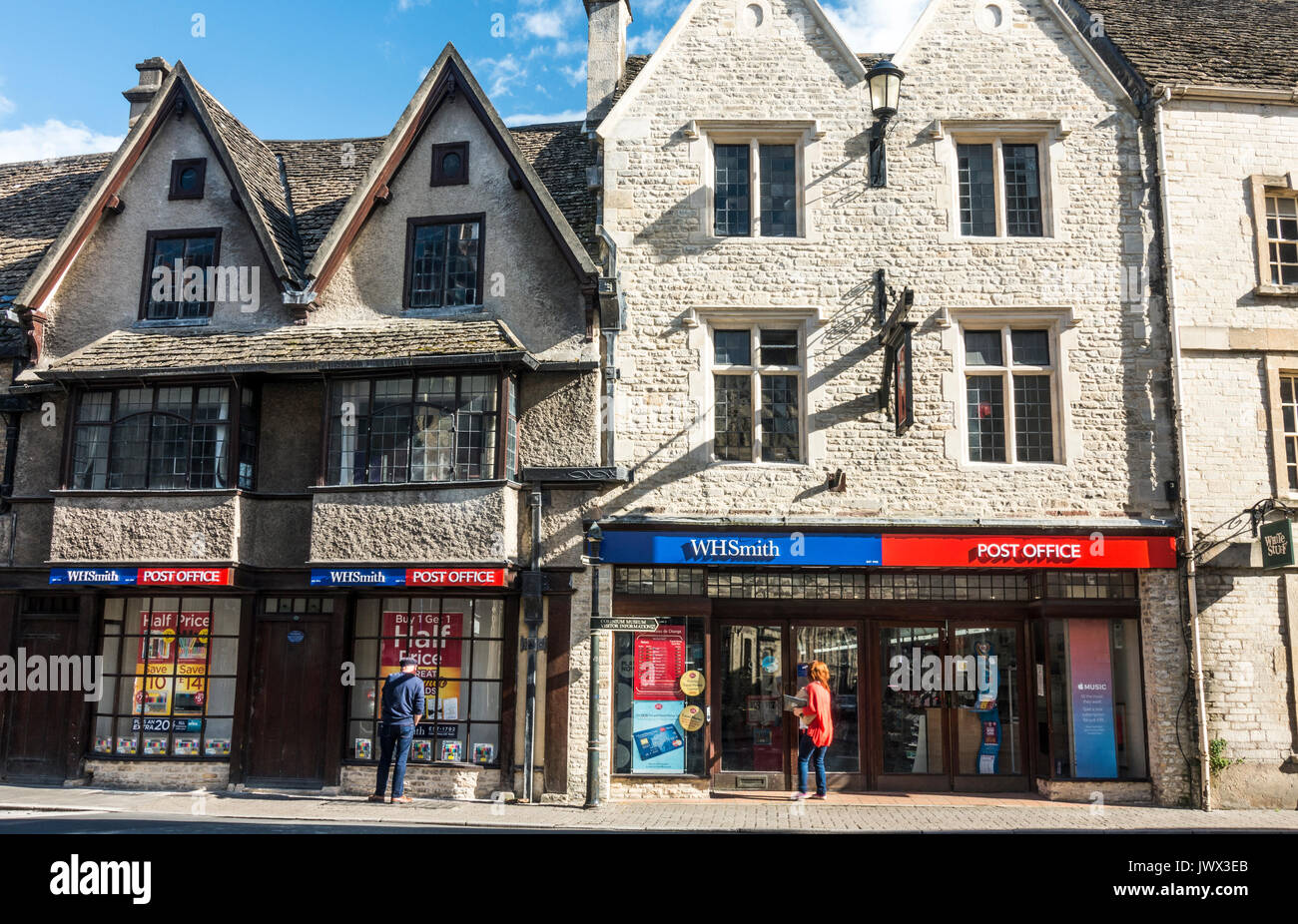 Shop / store branch of WH Smith and Post Office in period buildings, in the centre of the Cotswolds town of Cirencester, Gloucestershire, England, UK. Stock Photo