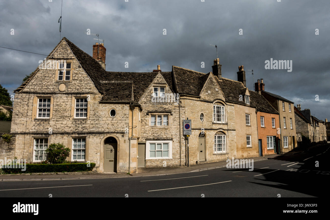 Beautiful terraced houses bathed in early evening light, Park Street, Cotswolds town of Cirencester, Gloucestershire, England, UK. Stock Photo