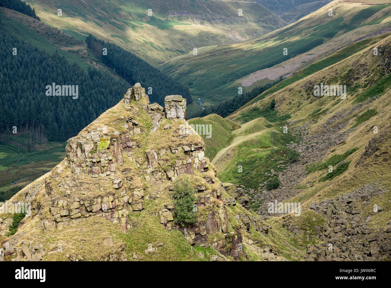 Alport Castles, A dramatic natural feature in the Alport valley, Peak District, Derbyshire, England. The pointed outcrop known as The Tower. Stock Photo
