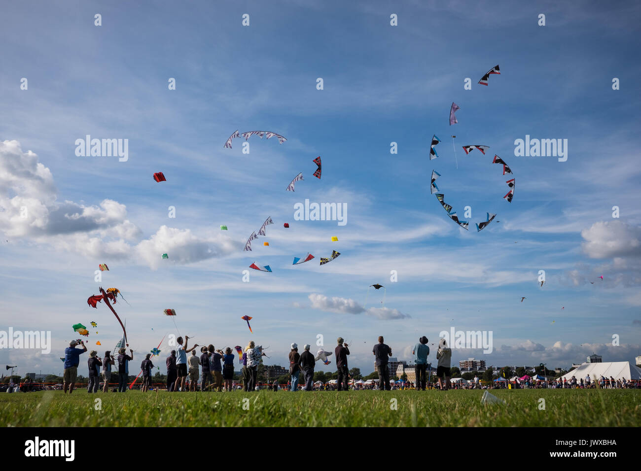 People at the Portsmouth International Kite Festival 2017, on what was the 26th anniversary for the festival held on Southsea Common Stock Photo